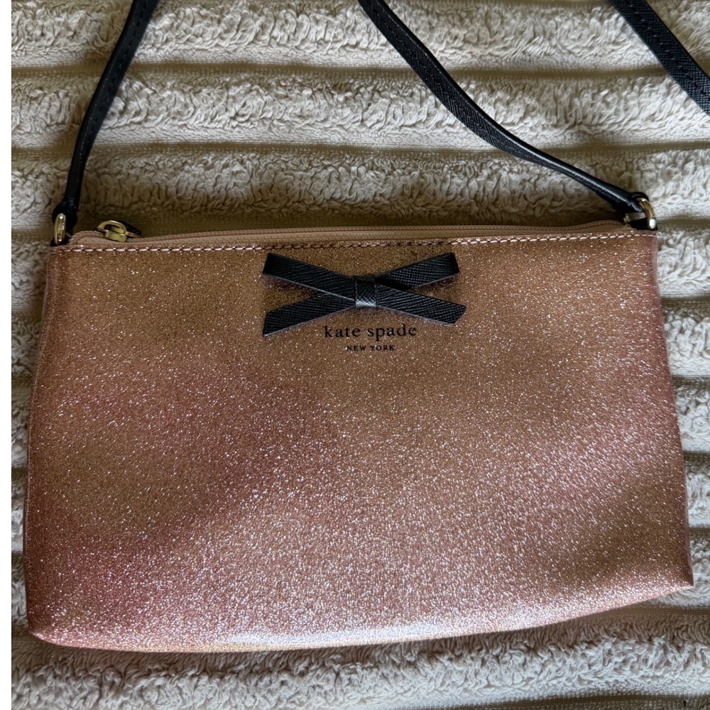 Kate Spade New York Rose Gold Glitter Crossbody Bag with Black Bow Detail